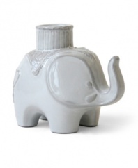 From tusk til dawn. Jonathan Adler brings the Indian elephant to life and to light with this glazed white candlestick, crafted of high-fired stoneware.