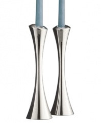 Named for Zeus' intrepid eagle, Aquila candlesticks possess a quiet power and strength. Distinguished by a gently turning spiral and clean lines crafted in Nambé alloy, this statuesque pair illuminates your table with modern grace. Designed by award-winning designer Lou Henry.