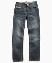 Casual comfort and cool style. That's exactly what he'll get in these straight-fit jeans from Guess.