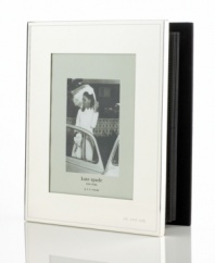 Polished to a lustrous mirror-like finish, this elegant bookshelf album cloaks your wedding memories in sheer, subdued splendor. With Mr. & Mrs. engraved in the bottom right corner of the cover and additional engravable 1 silver-plated inserts to add your own personalized touches. Holds 160 5 x 7 photos.