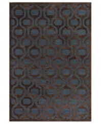 Lose yourself in the spellbinding look and unbelievably plush feel of Couristan's Pave Bezel Medallion rug. Woven of a luxe blend of viscose, silk and chenille for one-of-a-kind texture and high-low carved effect, the medallion-patterned rug is rendered in rich sapphire and mahogany hues to add high style to any room.