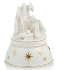 Holy family, holy night. Make your home sing with a beautiful porcelain music box sculpted with Jesus, Mary and Joseph. Twinkling gold stars against pure white infuse this Mikasa treasure with graceful spirit. Plays Silent Night.