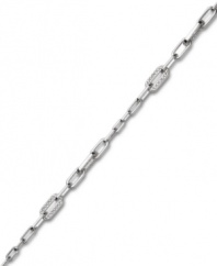Embrace the elegance of Swarovski's simple, delicate chain link bracelet. A lovely, ladylike look that will never go out of style, it's adorned with clear pavé crystal detailing and set in silver tone mixed metal. Approximate length: 6-1/4 inches.
