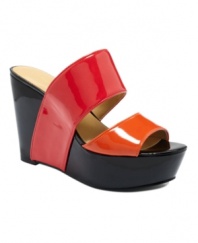 The minimalistic silhouette of the Larysa wedges by Nine West lets the focus turn to their bold-as-you-want color block detail. A high-shine finish takes the look to even bolder territory.