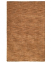Varying shades of tan create a lush texture that's sure to make waves in your home. Crafted by hand-tufting fibers of soft, rich wool, this area rug from St. Croix is rustic and refined, boasting a tonal flow that adds subtle dimension to your decor.