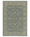 Cool and cordial, this sweet Karastan area rug welcomes you to the most comfortable spot in your home. A lane-blue ground is trimmed with soft beige patterns in a pleasing design inspired by antique English manor house rugs. Wool construction with cotton foundation for added strength and softness.