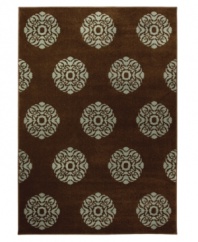 A smart medallion pattern in contrasting light and dark hues creates a dramatic impact in this Tribecca rug. Constructed of soft, durable polypropylene, this rug is a sophisticated addition to any room. (Clearance)