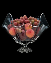 An eye-catching bowl adds sophistication to any gathering. Rendered in sand-cast, hand-finished aluminum, the base features a pattern of sculpted grapes. Complete with acrylic bowl.