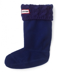 A supersoft and cozy sock that looks just like Hunter's classic welly, with fold top and logo appliqué.
