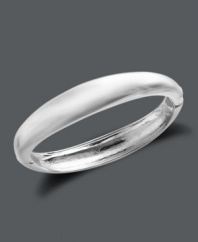 Add a Touch of Silver with this polished style. This smooth hinge bangle slips on easily and shimmers in silver over zinc alloy. Approximate diameter: 2-1/3 inches. Approximate bangle width: 2/5 inch to 1/2 inch.