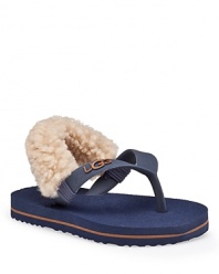 Cute UGG® Australia logo sandal with elasticized slingback strap and soft shearing overlay.