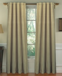 The Soho Silk Stripe window panel is all about style with subtle striping on lustrous silk. What's more, the panel features a poly-cotton lining and 100% cotton flannel interlining to provide additional insulating properties to your window, helping keep cold air out in the winter and hot air out during the summer, as well as help reduce light penetration. (Clearance)