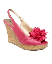 A peep-toe that's fun and fresh all at once! CL by Laundry's Ilena2 slingback wedges are perfect for a peek at your pretty pedicure and feature a cork heel and flirty rosette detail in front.