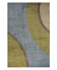 Vivid tones of teal and light brown shape the charming style of this alluring New Wave rug. Hand-tufted Chinese wool provides an exceptionally soft feel, while a hand-carved finish adds extra depth and lustrous shine. Inspired by twentieth-century decorative arts, the rug boasts a distinctive modern look with a truly whimsical character.
