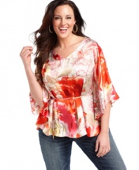 Enrich your neutral bottoms with J Jones New York's butterfly sleeve plus size top, cinched by a belted waist.