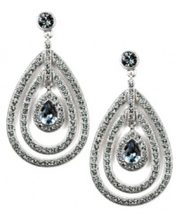 A bolt from the blue. Gorgeous Indian sapphire-hued glass accents adorn these dazzling drop earrings from Givenchy. Featuring a unique orbital silhouette, they're set in silver tone mixed metal. Approximate drop: 2-1/4 inches.