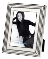 Add new elegance to beautiful memories with Vera Wang's With Love Blanc picture frame. Geometric detail lends metallic shimmer to creamy white enamel in a home accent that invokes modern and deco design.