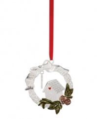 The celebration starts at home, so make it extra special with the silver-plated 2011 Bless This Home Christmas ornament. With a red heart, holiday greens and a dated charm. By Lenox. Qualifies for Rebate