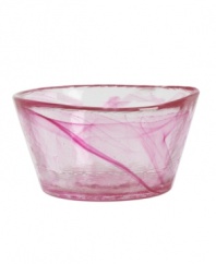 From the famed Scandinavian glass designers at Kosta Boda, this large Mine bowl has a dreamy swirled quality that brings color and contrast to any table.