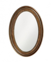 Relish in the timeless grace of Howard Elliot's Ethan mirror. An oval design with decorative fluting and a beaded inner edge adds new polish to the master bedroom or dining area. With a rich bronze finish.