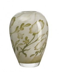 Striking when filled with your favorite colorful blooms or a stunning accent on its own. This hand-made glass vase designed by Olle Brozen for Kosta Boda lends sophistication to your tabletop or mantlepiece. Measures 7-1/8 H.