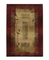 This square rug features a striking design of two vines in silhouette against a ground of rectangles framed with borders. Hues of sage green, gold, beige and russet blend into each other with striations and stain-like effects to impart a weathered, timeworn feel.