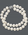 Decorate your wrists with not one, but two stands of sophisticated pearls. This shimmering bracelet features white cultured freshwater pearls (8 mm) and an elegant 14k white gold clasp. Approximate diameter: 3-1/2 inches. Approximate length: 7-1/2 inches.