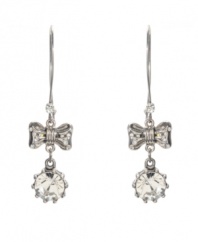 Get flirty, feminine style in an instant. Betsey Johnson's chic drop earrings feature a silver tone mixed metal setting with crystal-coated bows and circular glass stone drops. Approximate drop: 3 inches.