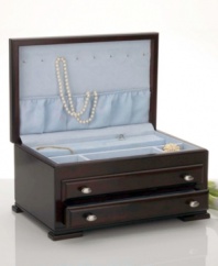 A light blue, imitation-suede interior contrasts the dark mahogany finish of this stylish jewelry case. Two drawers with brushed nickel pulls, plus wells for earrings and bracelets, a double ring bar and eight necklace hooks offer generous storage space for your jewelry collection.