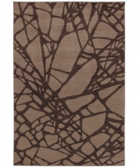 Taking artwork to a whole new level, this impressive area rug boasts a bold, clean-lined abstract design rendered in rich earth tones. Crafted from two-ply nylon yarn to impart a soft hand and a dense pile that is eminently durable and easy to clean.