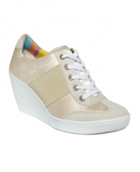 Sidewalk style meets catwalk fashion, by Nine West Original. The Preston wedge sneaker is an old-school canvas design amped up with an on-trend wedge.