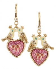 Sweet and sentimental. Every day is Valentine's Day with these darling drop earrings from Betsey Johnson. Featuring a pretty pair of lovebirds, they're adorned with glittery hearts and sparkling crystals. Crafted in gold tone mixed metal. Approximate drop: 2 inches.