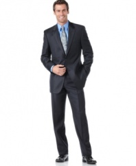 Strike the right balance between classic sophisticated and modern style with this smooth navy suit from Alfani.