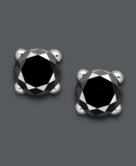 Steal the show with dramatic diamonds. Victoria Townsend's bold black diamond (1/2 ct. t.w.) stud earrings stand out against a polished sterling silver setting. Approximate diameter: 1/8 inch.