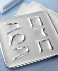 A traditional Passover seder plate, rendered with modern flair. Cast of Nambe alloy featuring Hebrew letters traced in raised lines, creating slopes and shallow grooves to display the holiday's ceremonial foods-with the first letter of each food represented on the plate. The contemporary design infuses this time-honored ritual with striking new elegance.
