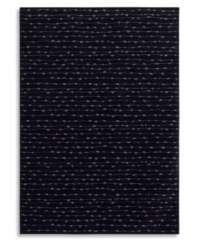 This soft, texturally interesting area rug from Karastan adorns your floor with an organic stripe pattern that suggests the look of beads strung across a field of deep, bold indigo. Ideal for any decor, made from 100% premium worsted 2-ply wool for a soft hand and long-lasting wear.