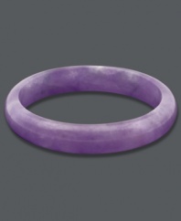 Add flourish to your look with a pop of brilliant purple color. This solid jade bangle (10-1/2-13 mm) comes in a vibrant lavender hue and slips effortlessly over the wrist. Approximate diameter: 3 inches.