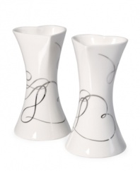 Spark some romance. A loopy platinum design and heart-shaped openings define Love Story candle holders with elegant whimsy. In lustrous white porcelain from Mikasa.