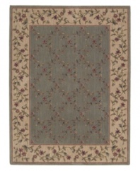 Choose floral and your floor will be sprouting with life. This elegant rug features a gentle palette with a latticework of blossoming vines allover. Bearing the rich patina of premium-quality Opulon(tm) yarns, each rug boasts a densely woven and strikingly luxurious pile that's a pleasure to touch and admire. One-year warranty.