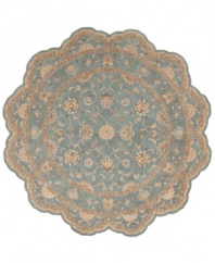 Bring new distinction to your home. Marked by its delicate aqua color palette and luxuriously soft texture, this handcrafted rug recreates the elegance of 17th Century Persian carpets. Hard-twist yarns are specially dyed for a subtlety of coloration producing a vintage look similar to traditional vegetable dyes.