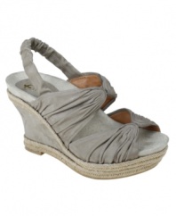 This sandal is begging to be put on...not taken off. Get to know the unparalleled comfort of the Javea wedge sandals by Earthies, featuring a contoured footbed, cupped heel and soft straps.