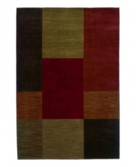 Step into charming style and eye-catching color. With sharp-looking geometric squares connecting in mixed tones of red, purple and muted green, this attractive rug achieves a bold, beautiful presence no matter where its placed in your home.