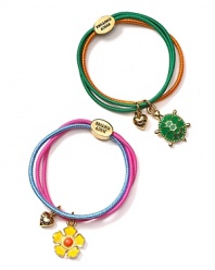 From Juicy Couture, darling hair elastics, bundled in groups of three and adorned with a heart and flower or turtle charms.