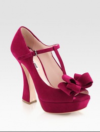 Lifted by an arched heel, this suede platform style has an adjustable t-strap and elegant bow adornment. Self-covered heel, 5 (125mm)Covered platform, 1 (25mm)Compares to a 4 heel (100mm)Suede upperLeather lining and solePadded insoleMade in ItalyOUR FIT MODEL RECOMMENDS ordering one half size up as this style runs small. 