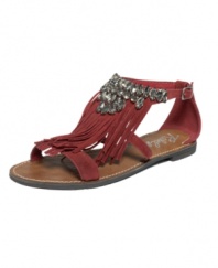 Sparkly with plenty of movement. Rebel's Apache Fringe flat sandals feature a fringed vamp that's topped with layers of rhinestones. Such an interesting, cute combo.