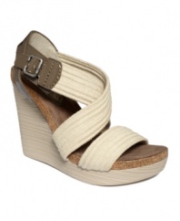 Layer on the trends. The Nora sandals by Gunmetal stack up perfectly with a textured wedge heel, cork trim and thick, fabric straps.