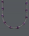 Perfect your look with a pop of regal color. Necklace features 60 carats of amethyst beads (4-5 mm and 9-10 mm) set in sterling silver with a tin-cup design. Approximate length: 18 inches.