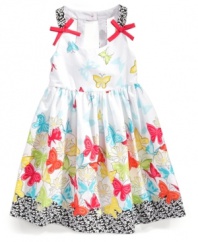 Flutter through the flowers. This sundress from Bonnie Jean is perfect for prepping her for sunny tea parties.