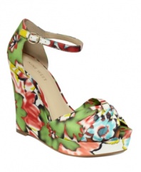 Stuck on solids? The Letitgo wedge sandals by Nine West are the perfect remedy. The fun, all-over Brasil-inspired prints take your outfits from boring and blah to bright and beautiful.