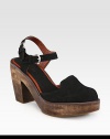 Lifted by a wooden heel and platform, a sweet adjustable Mary Jane strap adds Parisian charm to this soft nubuck leather slingback silhouette. Wooden heel, 3 (75mm)Wooden platform, 1 (25mm)Compares to a 2 heel (50mm)Nubuck leather upperLeather liningRubber solePadded insoleImportedOUR FIT MODEL RECOMMENDS ordering one half size up as this style runs small. 